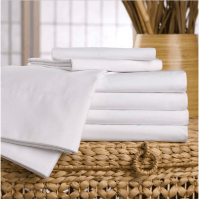 a group of white hotel flat sheets