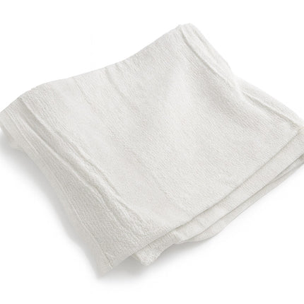 white economy hotel bath towel folded into square shape on white backgroud