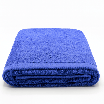 Folded blue towel on a white background