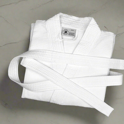 nicely-folded-white-bathrobe