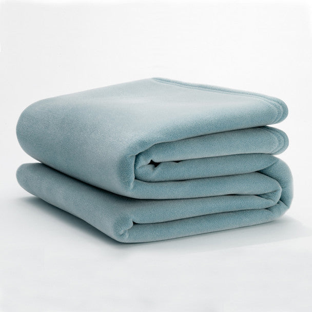 blue blanket folded on white background