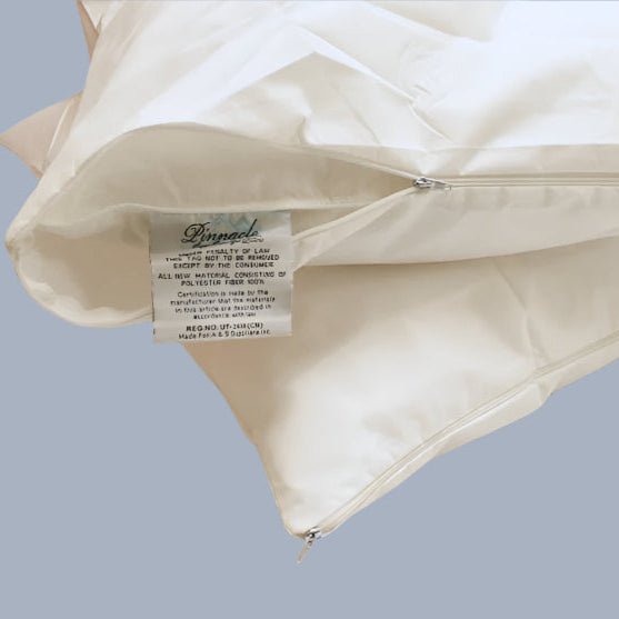 King Zippered Waterproof Pillow Protector seen on a bed, ensuring pillows stay fresh and protected from spills and allergens.