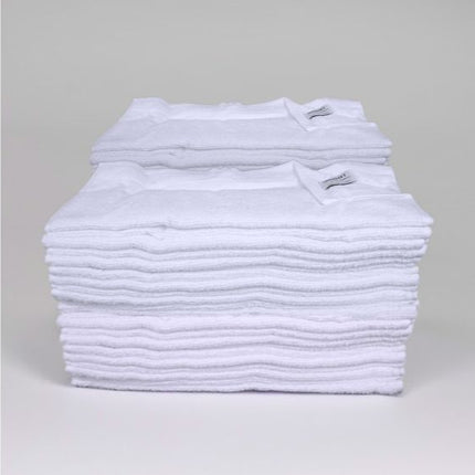 Soft and absorbent Summit White Bath Mat 20"x30" perfect for hotels and guesthouses, made from durable cotton-poly blend.