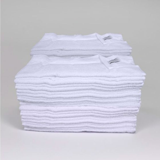 Soft and absorbent Summit White Bath Mat 20"x30" perfect for hotels and guesthouses, made from durable cotton-poly blend.