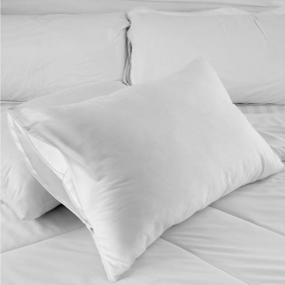 King Zippered Pillow Protector securely shields pillows from spills, stains, and allergens for lasting freshness.