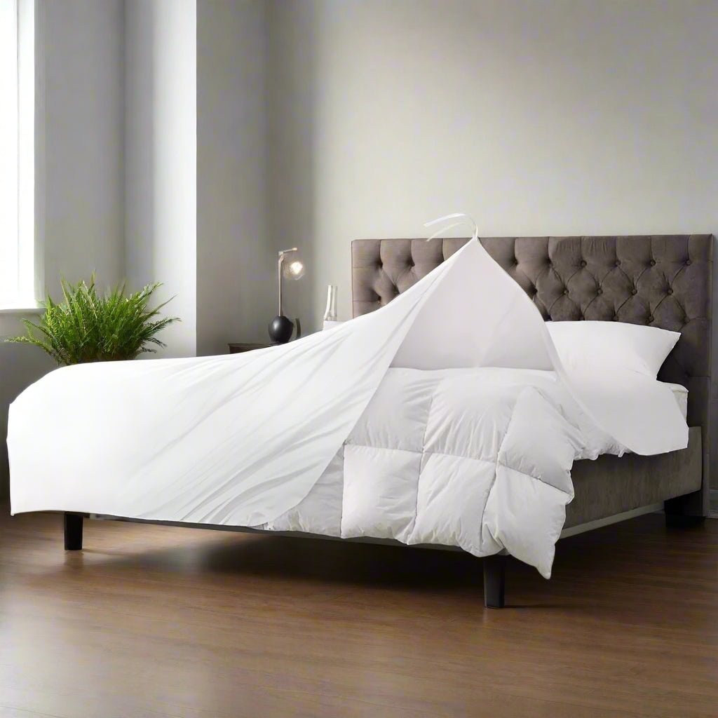 a white hotel duvet cover on the bed