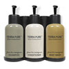 terra pure shampoo, conditioner, and body wash dispenser bottles on triple bracket on a white backgrounds