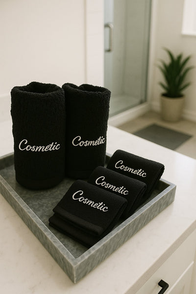 black cosmetic towels in a hotel bathroom