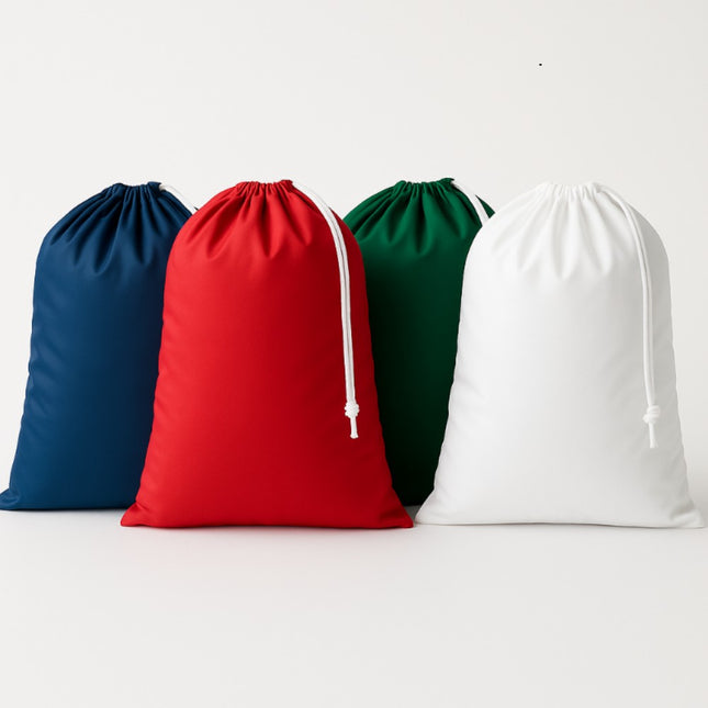 Four drawstring bags in blue, red, green, and white on a light gray background