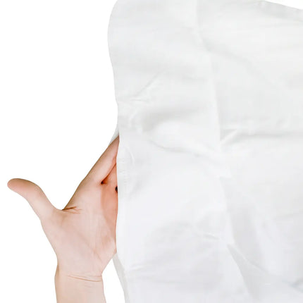 hand in white duvet cover opening