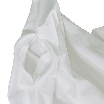 Close-up of white fabric with folds on a white background