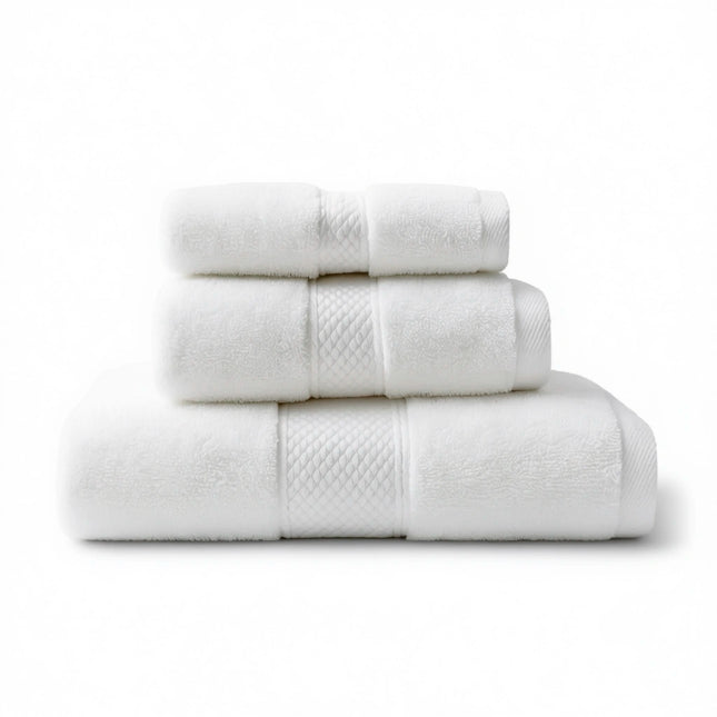 Stack of white towels on a white background