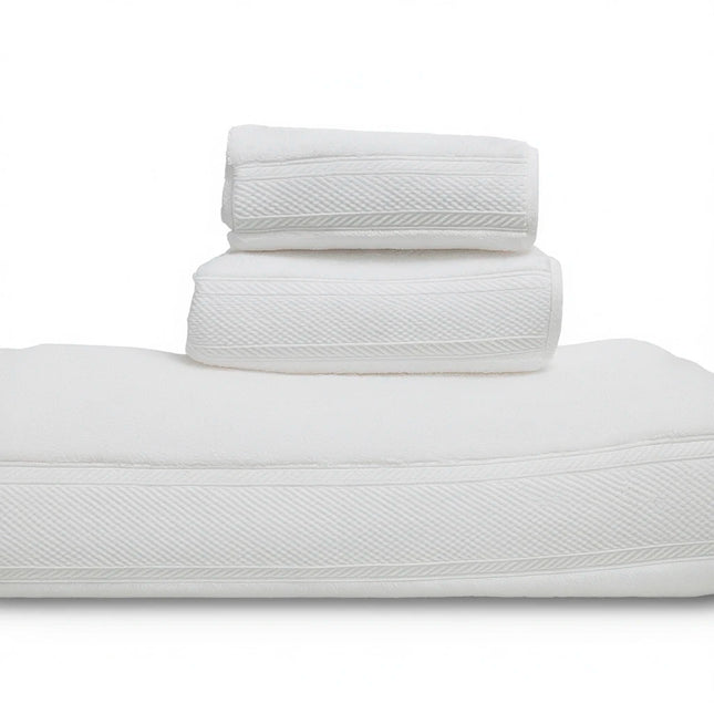 Stack of white towels on a white background