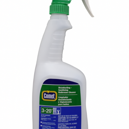 Spray bottle with green nozzle and labeled Comet cleaner on a white background
