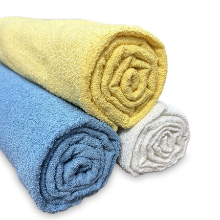 Soft and vibrant Basic Solid Pool Towels in blue, yellow, and white, perfect for budget-friendly poolside comfort.
