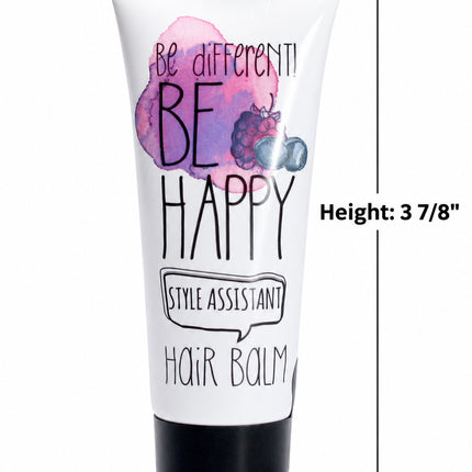 A white tube of hair balm with a black cap, featuring a pink and purple berry graphic and the text 'BE HAPPY' and 'STYLE ASSISTANT HAIR BALM'. The image includes dimension lines and text showing the product's height, top, and bottom measurements.