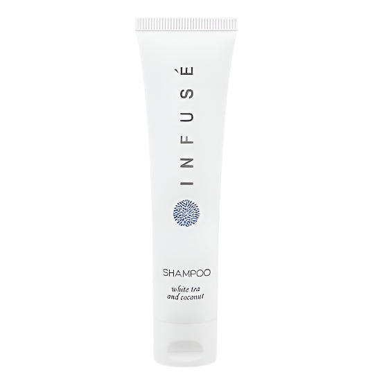 Infusé White Tea & Coconut Shampoo in a 1 oz tube, offering luxurious, vegan-friendly hair care.