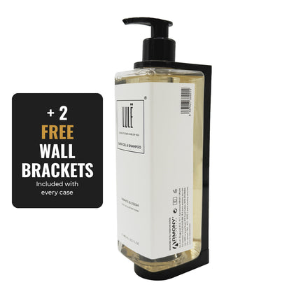 Lule pump bottle mounted in a black wall bracket – 2 FREE wall brackets included with every case